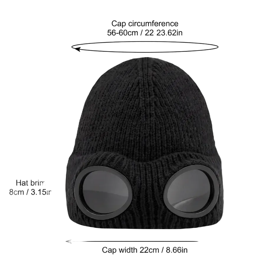 Black knit ski cap with integrated goggles, shown with measurement labels and arrows indicating cap circumference, hat brim, cap depth, and cap width on a white background.