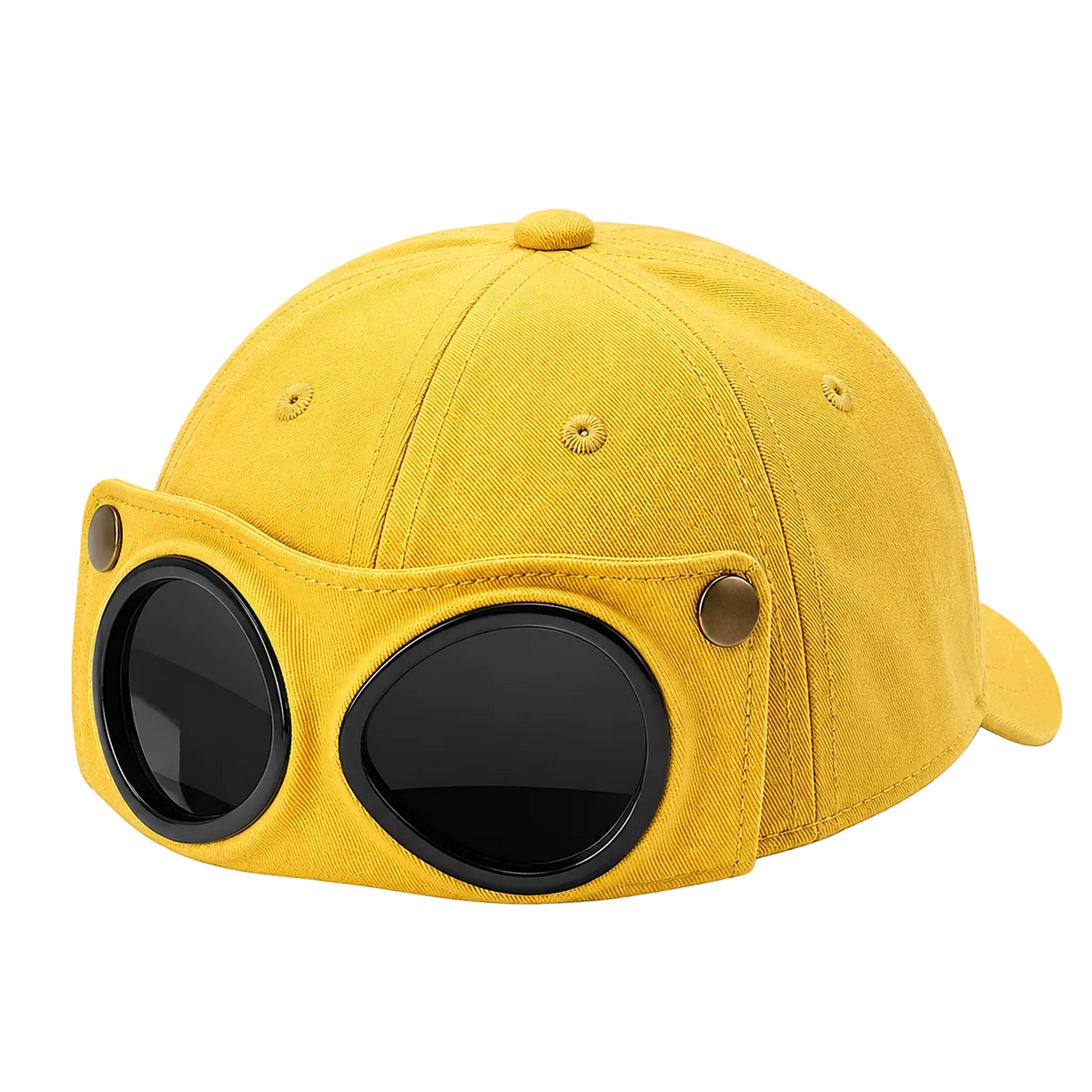 A yellow canvas baseball cap with a unique front attachment featuring two large black oval lenses and small gold-tone metal rivets, shown on a transparent checkered background.
